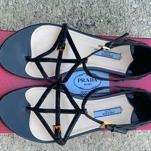 Women’s black patent leather Prada flat gladiator sandal size 36.5